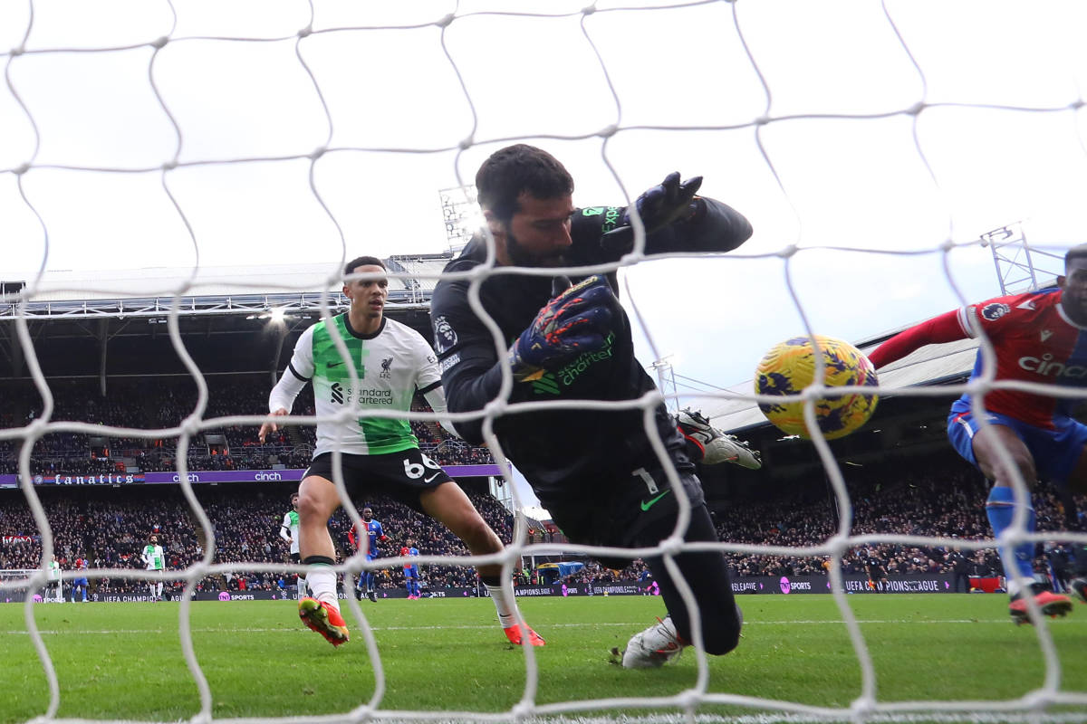 Liverpool goalkeeper Alisson Becker pictured making an impressive save during his team's 2-1 win at Crystal Palace in December 2023